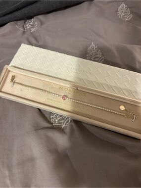 Gold Tennis Bracelet with Pink Heart Accent
